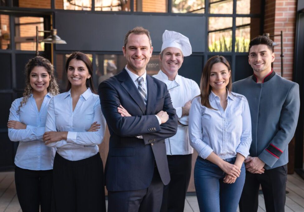 Group of diverse professionals smiling together.